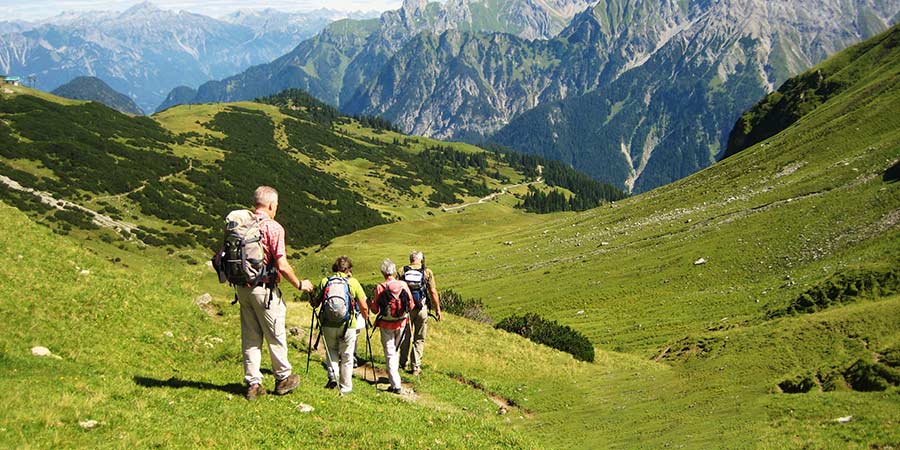 Group of people walking in the Austrain Alps. 